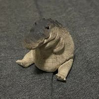 gomu gator logo